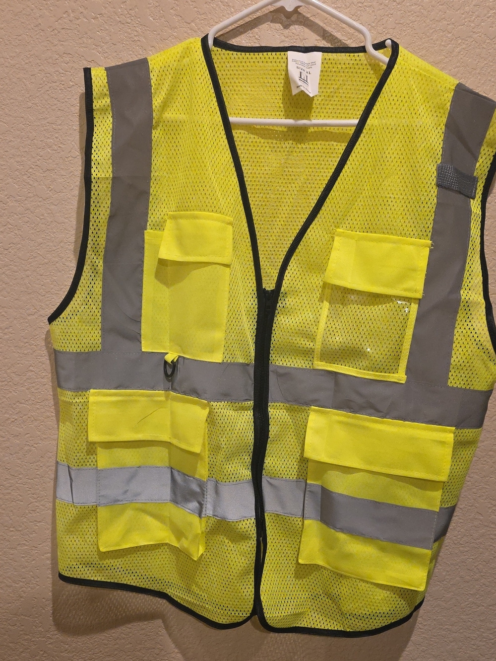 High-Visibility Yellow Safety Vest with Multiple Utility Pockets